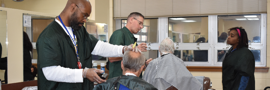 Men having their hair cut in a barber shop