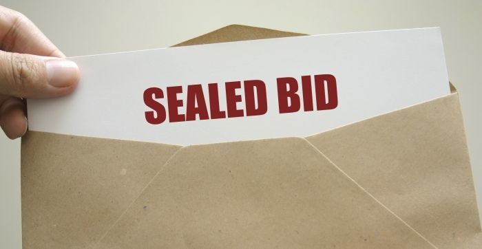 Envelope with letter that reads Sealed Bid